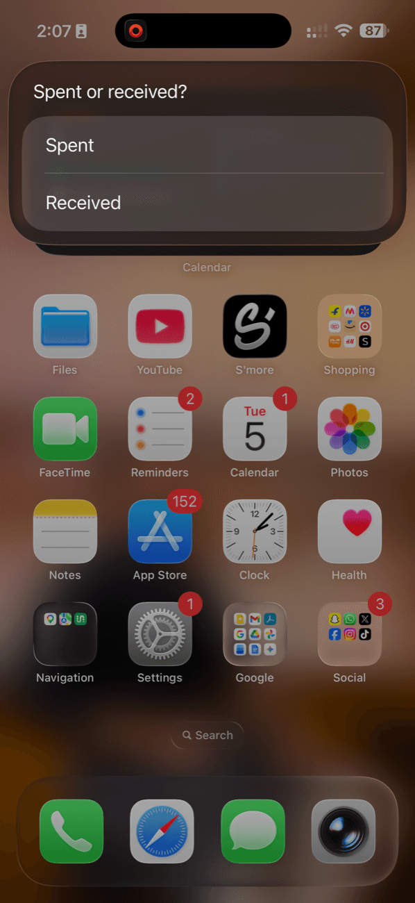 iPhone lock screen, pressing the Action Button